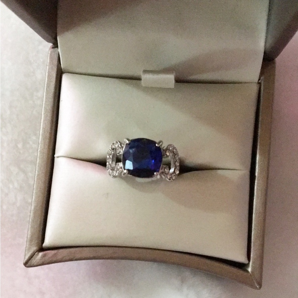 Women’s Silver Color and Blue Ring